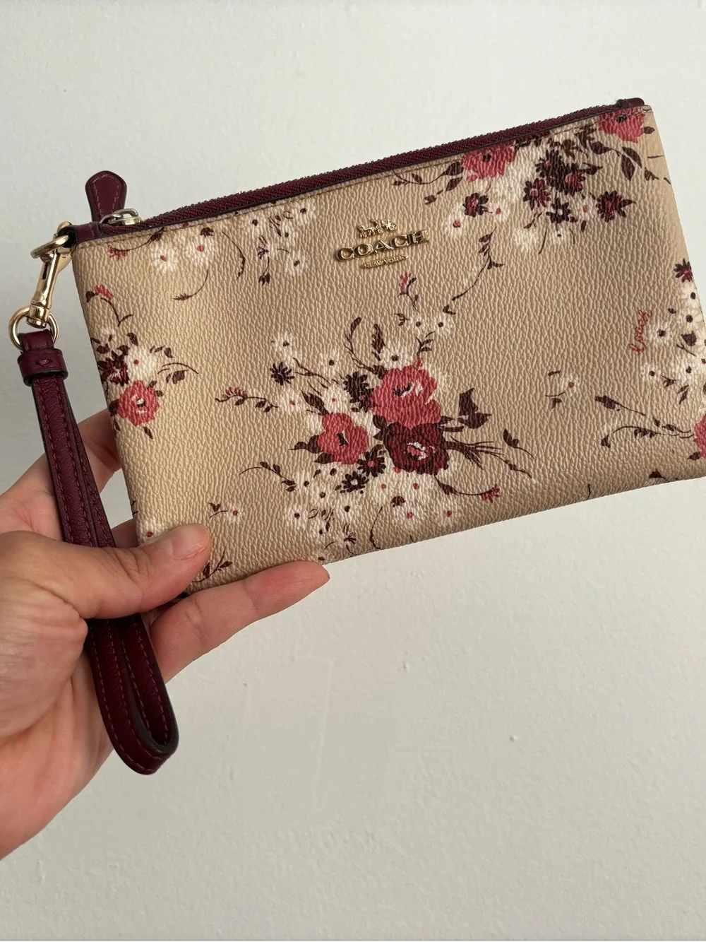 Coach Beige Floral Wristlet with Burgundy Accents